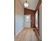 Inviting entryway with a decorative front door, hardwood floors, and a warm color scheme at 23846 Genesee Village Rd, Golden, CO 80401