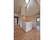 Hallway with hardwood floors, neutral paint and stairway to second floor at 23846 Genesee Village Rd, Golden, CO 80401