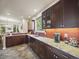 Well-appointed kitchen features sleek countertops and ample cabinet space at 6432 S Robb Ct, Littleton, CO 80127