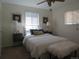 Cozy bedroom with soft lighting, plush bedding, and stylish decor elements at 1271 Xapary St, Aurora, CO 80011