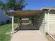 Attached carport that offers sheltered parking at 1271 Xapary St, Aurora, CO 80011