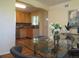 Well-appointed kitchen with wooden cabinets, stainless steel appliances, and modern backsplash at 1271 Xapary St, Aurora, CO 80011