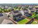 Wide aerial view showing the property's backyard, porch, and green exterior within neighborhood at 14912 Vienna Cir, Parker, CO 80134