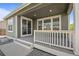 Comfortable back porch with recessed lights, offering a view of the green lawn and backyard at 14912 Vienna Cir, Parker, CO 80134