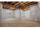 Unfinished basement featuring concrete floor and insulated walls with window openings at 14912 Vienna Cir, Parker, CO 80134