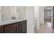 Bathroom featuring vanity with a large mirror at 14912 Vienna Cir, Parker, CO 80134