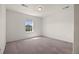 Bedroom featuring neutral walls, carpeted floors, and a window at 14912 Vienna Cir, Parker, CO 80134