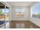 Bright dining room with large windows and a sliding door for natural light at 14912 Vienna Cir, Parker, CO 80134