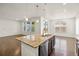 Open-concept kitchen with a large island, perfect for entertaining and Gathering gatherings at 14912 Vienna Cir, Parker, CO 80134