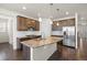 Beautiful kitchen with granite countertops, stainless steel appliances, and a large kitchen island at 14912 Vienna Cir, Parker, CO 80134