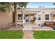 Charming home featuring a welcoming front porch, freshly cut grass, and meticulous landscaping at 3109 N Williams St, Denver, CO 80205