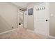 Hallway with access to stairs and bedrooms; carpeted floor at 3109 N Williams St, Denver, CO 80205