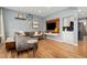 Cozy living room with hardwood floors, modern furniture and television at 3109 N Williams St, Denver, CO 80205