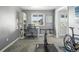 Bright bedroom provides a dedicated workspace with views of the lush landscape outside at 3543 Foxridge Trl, Highlands Ranch, CO 80126