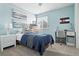 Cozy bedroom featuring a ceiling fan, closet and desk at 3543 Foxridge Trl, Highlands Ranch, CO 80126