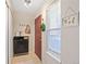 Bright entryway with stylish storage, coat hooks, and a window with natural light at 5300 E Cherry Creek South Dr # 124, Denver, CO 80246