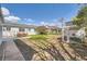 Beautiful backyard featuring a patio, garden, and garage at 1374 S Beach Ct, Denver, CO 80219