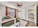 bedroom featuring bunk beds, wood floors, and a neutral color scheme at 1374 S Beach Ct, Denver, CO 80219