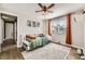 This bedroom offers great natural light, wood floors, and bunkbeds at 1374 S Beach Ct, Denver, CO 80219