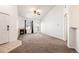 Bright living room with a cozy fireplace and balcony access, perfect for relaxing at 5756 N Genoa Way # 12-305, Aurora, CO 80019