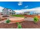 Spacious backyard with well-maintained lawn, gravel areas, and planting beds, creating an outdoor oasis at 638 W 175Th Ave, Broomfield, CO 80023