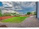 A lush green lawn, rock landscaping, and privacy fence surround this cozy backyard at 638 W 175Th Ave, Broomfield, CO 80023