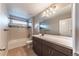 Bathroom featuring a tub, shower, and a large mirror over the vanity at 638 W 175Th Ave, Broomfield, CO 80023