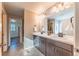 Bathroom featuring double sinks with modern fixtures and decor at 638 W 175Th Ave, Broomfield, CO 80023