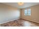 Bedroom featuring wood floors, large window and neutral paint and light fixture at 638 W 175Th Ave, Broomfield, CO 80023