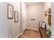 Inviting entryway featuring a wooden bench, coat hooks, stylish artwork, and a welcoming atmosphere at 638 W 175Th Ave, Broomfield, CO 80023