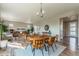 Inviting living room with open layout, wood floors, dining space, and lots of natural light at 638 W 175Th Ave, Broomfield, CO 80023