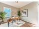 Bright home office with a modern desk, comfortable seating, and ample natural light at 638 W 175Th Ave, Broomfield, CO 80023