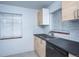 Modern kitchen featuring sleek countertops, stainless steel appliances, and ample natural light at 482 N Humboldt St, Denver, CO 80218