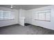 Neutral living room featuring plush gray carpet and natural light at 482 N Humboldt St, Denver, CO 80218