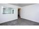 Bright living room featuring neutral walls, and plush gray carpet at 482 N Humboldt St, Denver, CO 80218