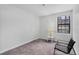 Bright bedroom features a neutral color palette and a window that provides natural light at 10950 W Florida Ave # 303, Lakewood, CO 80232