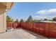 Backyard featuring privacy fence, a concrete patio, and room to relax and enjoy the outdoors at 1996 W 66Th Ave, Denver, CO 80221
