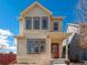 Charming two-story home with a classic design and well-maintained front yard under a bright blue sky at 1996 W 66Th Ave, Denver, CO 80221