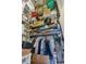 Organized closet with metal shelving containing boxes, containers, and hanging clothes for ample storage at 3100 Huron St # 4Q, Denver, CO 80202