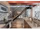 Modern kitchen with stainless steel appliances and an open view of the dining area at 3100 Huron St # 4Q, Denver, CO 80202
