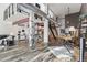Modern living space with open floor plan, home office, bike racks and modern staircase at 3100 Huron St # 4Q, Denver, CO 80202