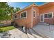 Backyard exterior showcasing a patio, well-maintained lawn, side of house, and stairs at 4195 W 111Th Cir, Westminster, CO 80031