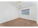 Bedroom with a ceiling fan, neutral walls and carpeting, and a window allowing for natural light at 4195 W 111Th Cir, Westminster, CO 80031