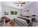 Cozy bedroom featuring modern decor, neutral colors and a large window at 4195 W 111Th Cir, Westminster, CO 80031