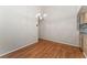 Empty dining room with hardwood floors and chandelier lighting at 4195 W 111Th Cir, Westminster, CO 80031
