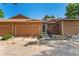 Home exterior showcases a two-car garage, manicured lawn, and well-maintained facade at 4195 W 111Th Cir, Westminster, CO 80031