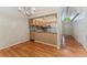 Open kitchen with a view to dining area, tiled backsplash and modern appliances at 4195 W 111Th Cir, Westminster, CO 80031