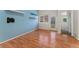 Bonus room with hardwood floors, TV mount, and sliding glass door at 4195 W 111Th Cir, Westminster, CO 80031