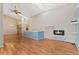 Bright, open living room with hardwood floors, fireplace and skylights at 4195 W 111Th Cir, Westminster, CO 80031
