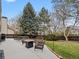 Outdoor patio with comfortable seating, perfect for entertaining and relaxation with beautiful landscaping at 1123 E 132Nd Way, Thornton, CO 80241